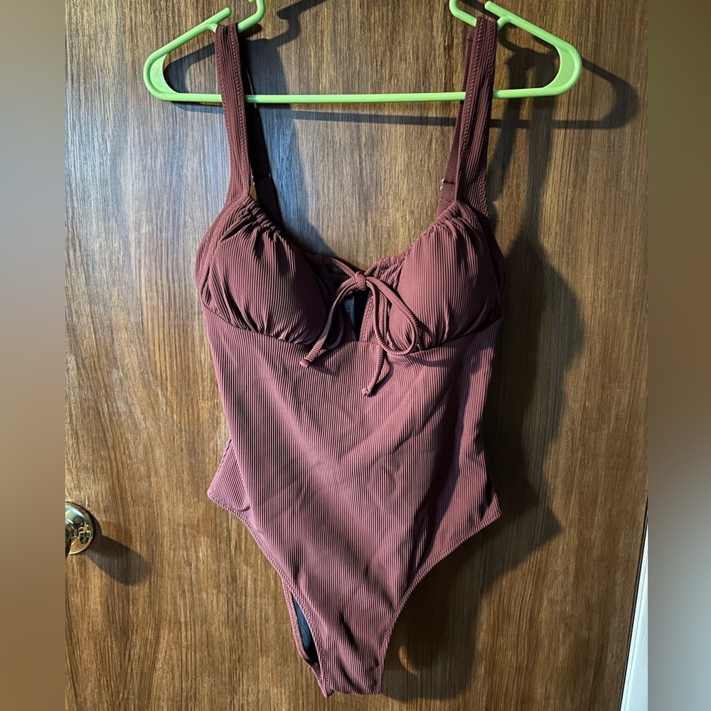 Ribbed one piece suit with drawstring top